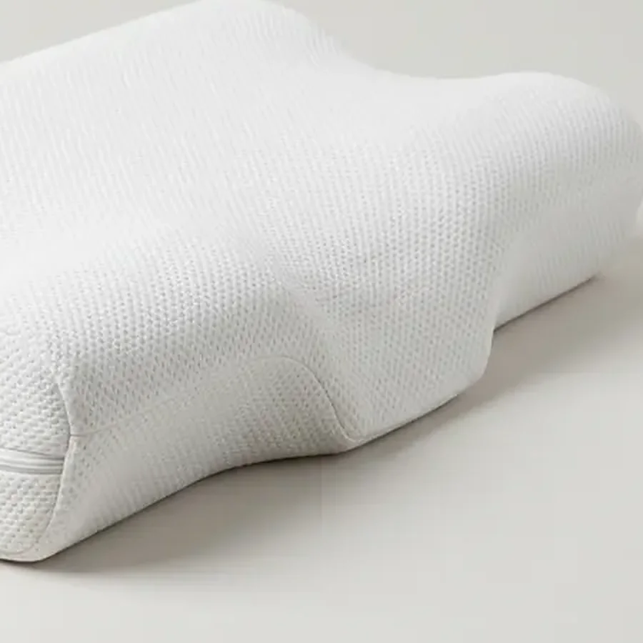 Pormenor da malha respirável branca da capa, vestida na almofada ergonómica